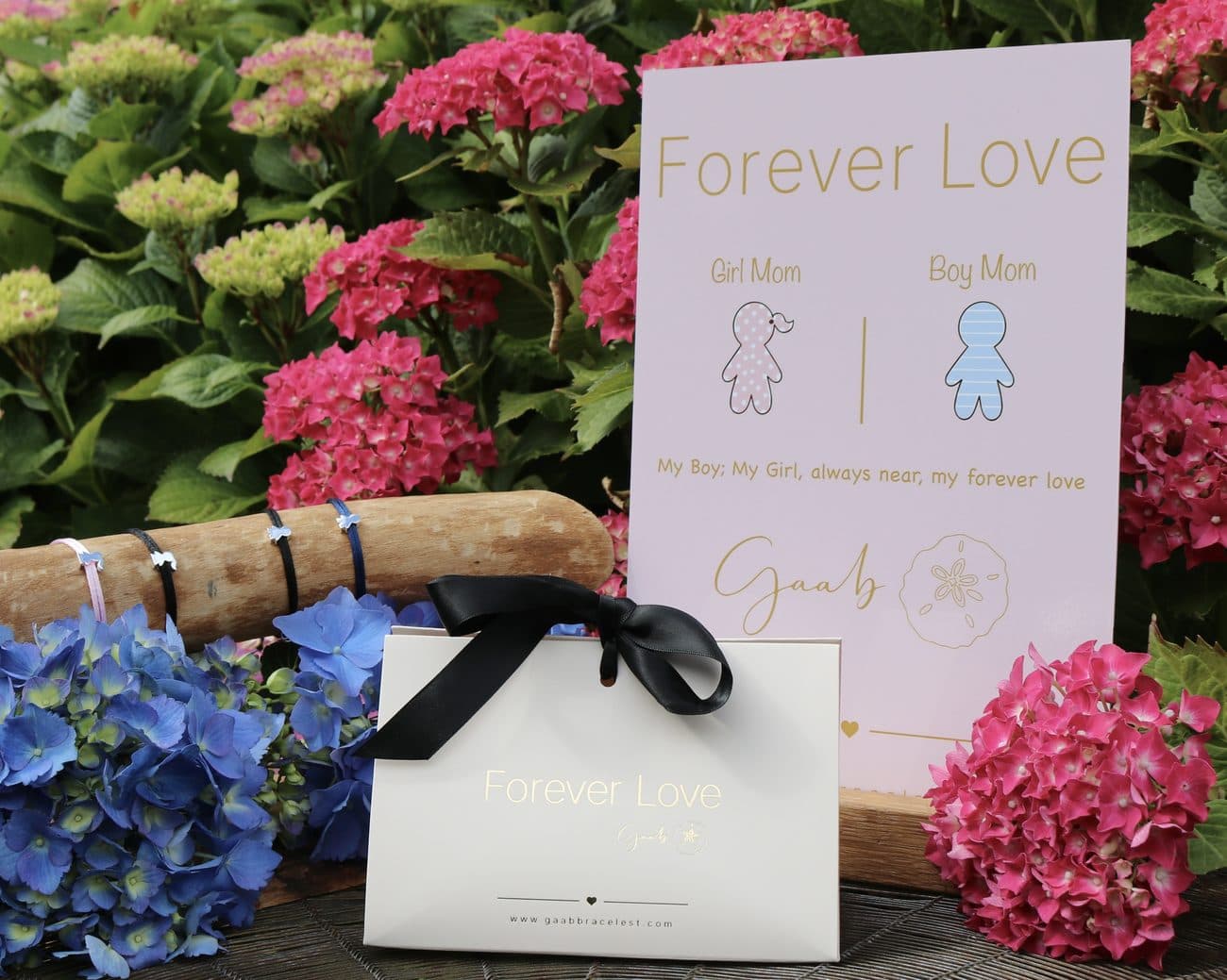 Gaab Forever Love display card and gift box among hydrangeas